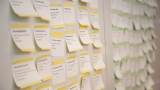 A photo of stickies with Tidy Dev Day issues on a wall